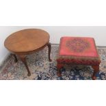 Stuart Jones square footstool, upholstered in red ground carpet type fabric, on cabriole legs, W50cm