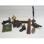 C20th carved wood flute, cast metal elephant money box, C20th brass desk bell, etc.