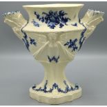 Creamware lozenge shaped vase with two bird handles, relief decorated with angels, and blue