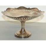 George V hallmarked silver pedestal fruit bowl, with pierced waved border, makers mark N B London