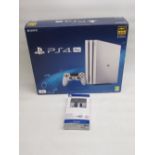 Simon Gregson Collection - Boxed PS4 White Glacier Pro 1TB and a boxed PS4 powerfast 4m play and