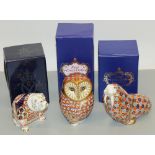Royal Crown Derby porcelain paperweights: Walrus, Bulldog, and Barn Owl, all silver stoppers, with