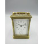 Early C20th French brass carriage clock alarm, white enamel Roman dial, outer minute track and