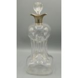 George V hallmarked silver spouted clear glass Glug-Glug decanter, with stopper, by Hukin & Heath