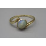 18ct yellow gold ring set with oval cabochon opal, stamped 18ct, size O, 1.7g