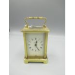 Bayard C20th French brass carriage clock timepiece, signed cream Roman dial with outer minute track,