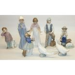 Nao by Lladro porcelain figures: boy shepherd, girl with candle, Shoeshine Boy, Girl Praying,