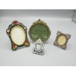 Three micro mosaic photograph frames, respective H 6cm, 6.5cm and 12cm (a/f) and a brass oval