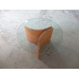 Contemporary coffee table, circular smoked glass top on curved laminated supports, D75cm H42cm