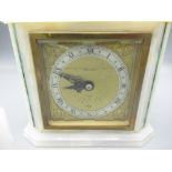 C20th Elliott mantle timepiece, square brass dial in white onyx case with malachite stringing, W17cm