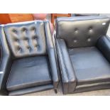 1960s mid century modern black faux leather armchair on tapered legs, H67cm and a similar black faux