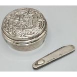 Late Victorian hallmarked silver circular dressing table jar, twist lock cover repousse with