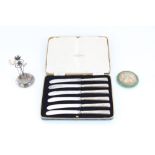 Six cased Art Deco hallmarked silver butter knives with ribbed geometric handles, John Sanderson and