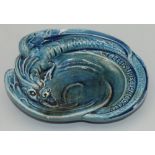 Burmantofts Faience for The Leeds Fireclay Company advertising dish modelled as dragon with