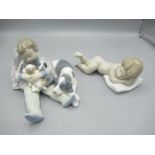 Lladro figure of a sleeping boy with dog and three puppies and another Lladro figure of a sleeping