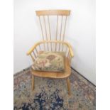 Modern ash and elm comb back Windsor chair with cow horn arms and cushion