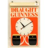 Guinness suspended advertising clock, Smiths movement, clear perspex with red, white and black