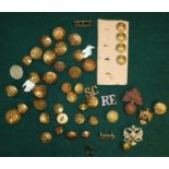 Collection of military brass buttons and some associated badges