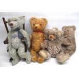 Schildkrot grey bear in rocking chair and three mid C20th and later bears incl. a Hermann open