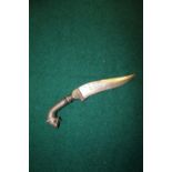 Indo-Persian wootz knife with curved blade. Metal handle in the shape of a tigers head, with