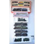 Collection of 7 well used OO gauge electric steam train models from Hornby, Lima, Mainline and Tri-