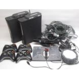 Two Xbox 360 consoles with 4 controllers, Xbox 360 Kinect device, Skylanders portal