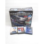 Boxed Sega Mega Drive with games