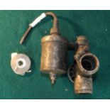 Early motorcycle carburettor (AMAC Ltd) and a carburettor screw top (AMAC Ltd)