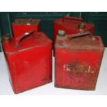 Four vintage petrol cans, including Shell with original brass stopper (4)