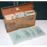Set of road maps for England and Wales, in own leather travel case.