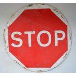 Steel plate vinyl image Stop/Go sign, diameter 59.8cm.