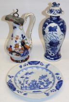 Blue and white Delftware plate with chinoiserie decoration, D22cm; C19th jug decorated with