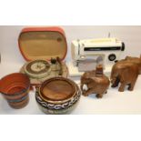 Two sewing machines incl. a Frister Rossman; elephant figures; two planters, record player, etc.