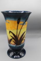 Moorcroft Pottery: Reeds at Sunset pattern footed vase, flared rim, tube lined with water reeds in