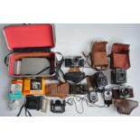 Collection of vintage camera equipment to include Kodak SIX-20 C and 44A Brownies with boxed flash