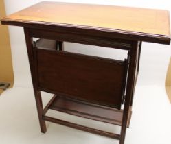 Early C20th mahogany card table with rotating fold over top, inset green baize playing surface