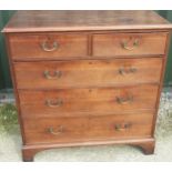 George 111 oak chest of two short and three long graduated ted cockbeaded drawers, with brass