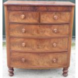 Victorian mahogany bow front chest of two short and three long cockbeaded drawers with turned wood