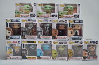 Fourteen boxed Star Wars Funko Pop figurines to include 3 x Baby Yoda Child figures (including Child
