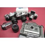 Various cameras incl. an Edixa Prismaflex, Canon Ixus L-1, Polaroid 340 etc