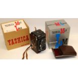 Yashica MAT LM camera with leather case and original box; Gnome photographic enlarger; and other