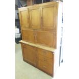 C20th beech kitchen cabinet, the upper section with three cupboard doors over two longer doors above
