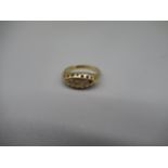 18ct yellow gold rub over ring, missing one diamond, stamped 18ct, size G, 2.4g, 2.7g
