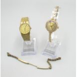 Ladies 9ct gold cased wrist watch with Roman dial, on rolled gold adjustable strap, a ladies