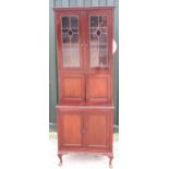 Early C20th mahogany side cabinet, with two lead glazed doors above a pair of panel doors,