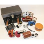 Cameras and photography equipment, incl. a Zeiss Ikon Movikon 8mm movie camera in leather case;