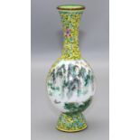 Chinese Canton enamel vase, painted with panels of mountainous landscapes, on a yellow ground, H17cm