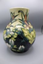 Moorcroft Pottery: Lamia pattern baluster vase of baluster form, tube lined with bullrushes and