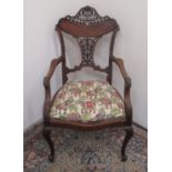 Edwardian inlaid and boxwood strung open armchair, with pierced back and splat with brass nail