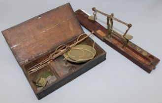 C19th mahogany cased folding brass and steel gold scales and C19th oak cased brass and steel hand